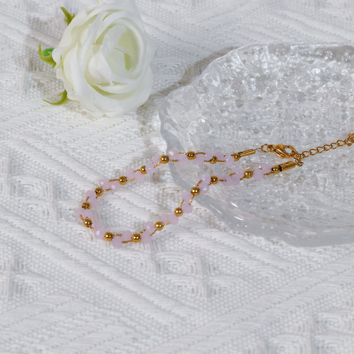 Handmade rose quartz beaded bracelet with 18K gold plated accents – styling view 3