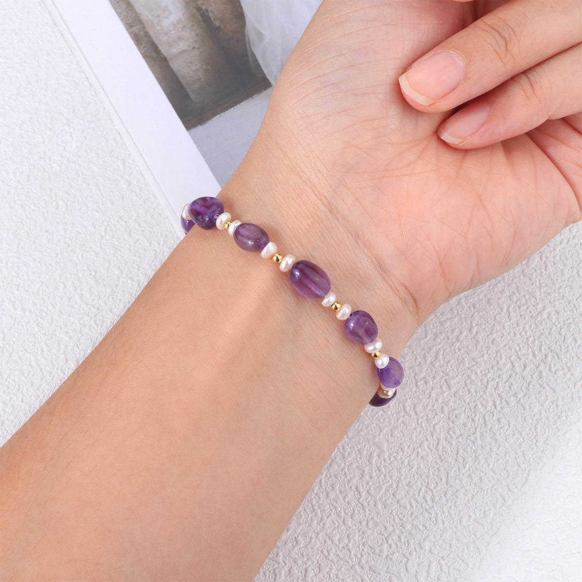 Handmade amethyst and freshwater pearl bracelet with 18K gold plated accents – styling view 19