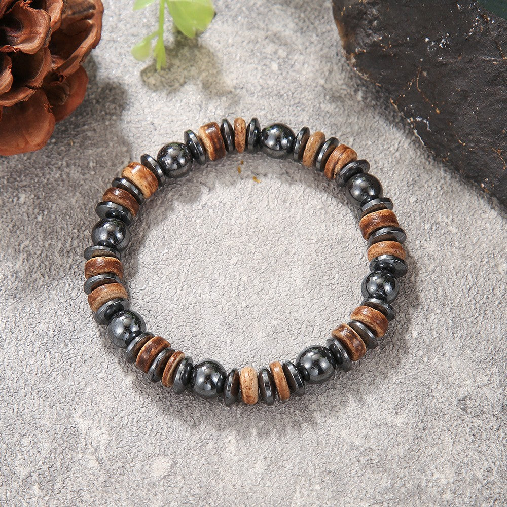 Boho earth-tone and black bead bracelet — detail view 10