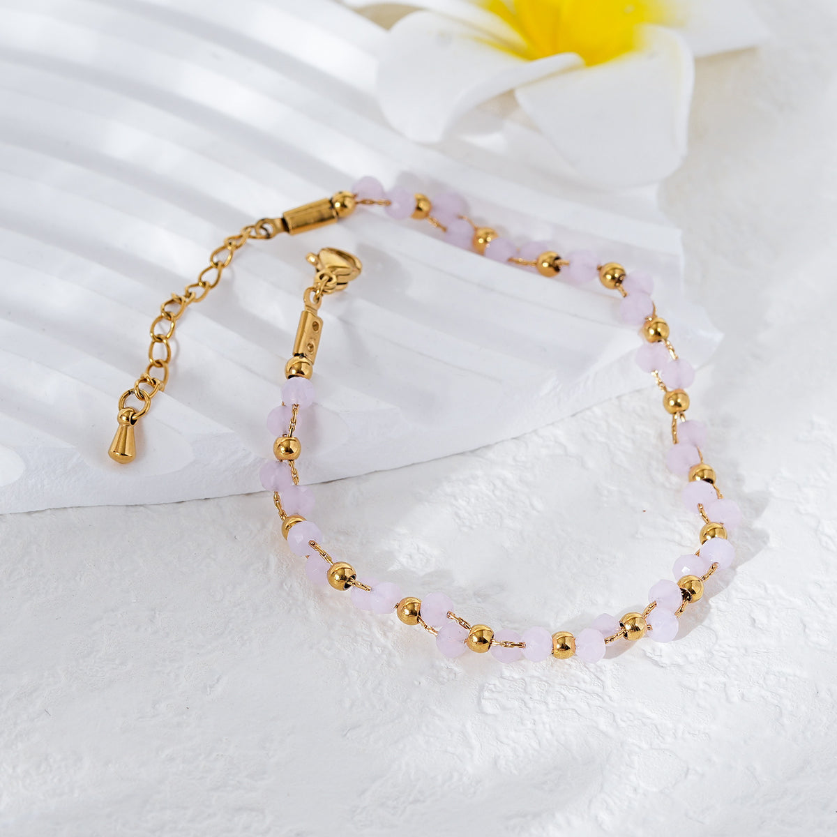 Handmade rose quartz beaded bracelet with 18K gold plated accents – styling view 13