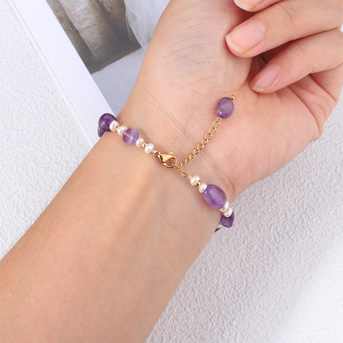 Handmade amethyst and freshwater pearl bracelet with 18K gold plated accents – styling view 18