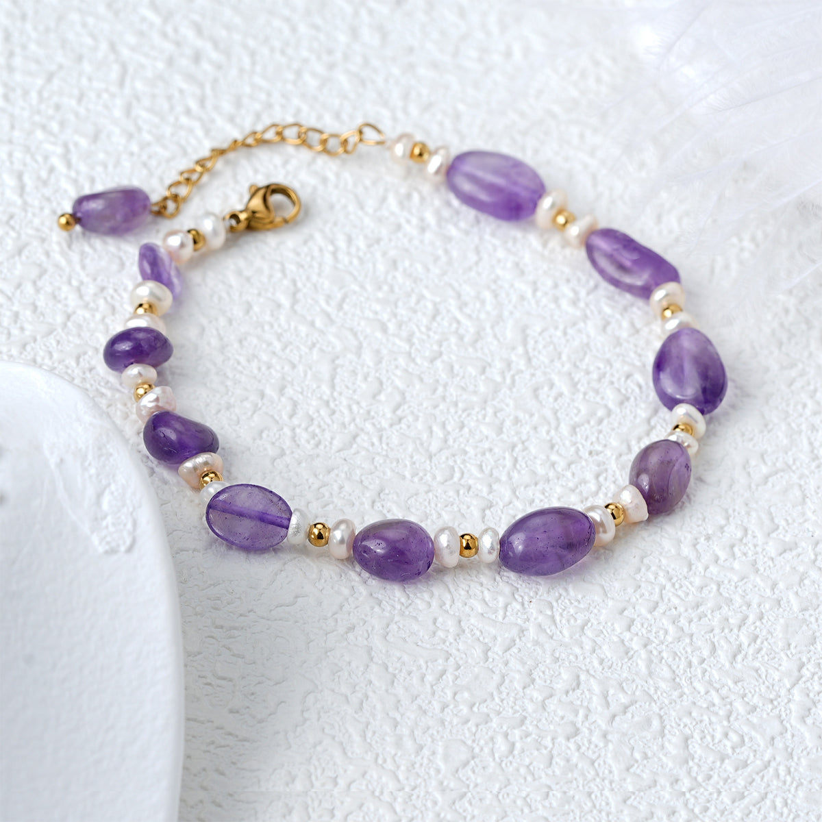 Handmade amethyst and freshwater pearl bracelet with 18K gold plated accents – styling view 3